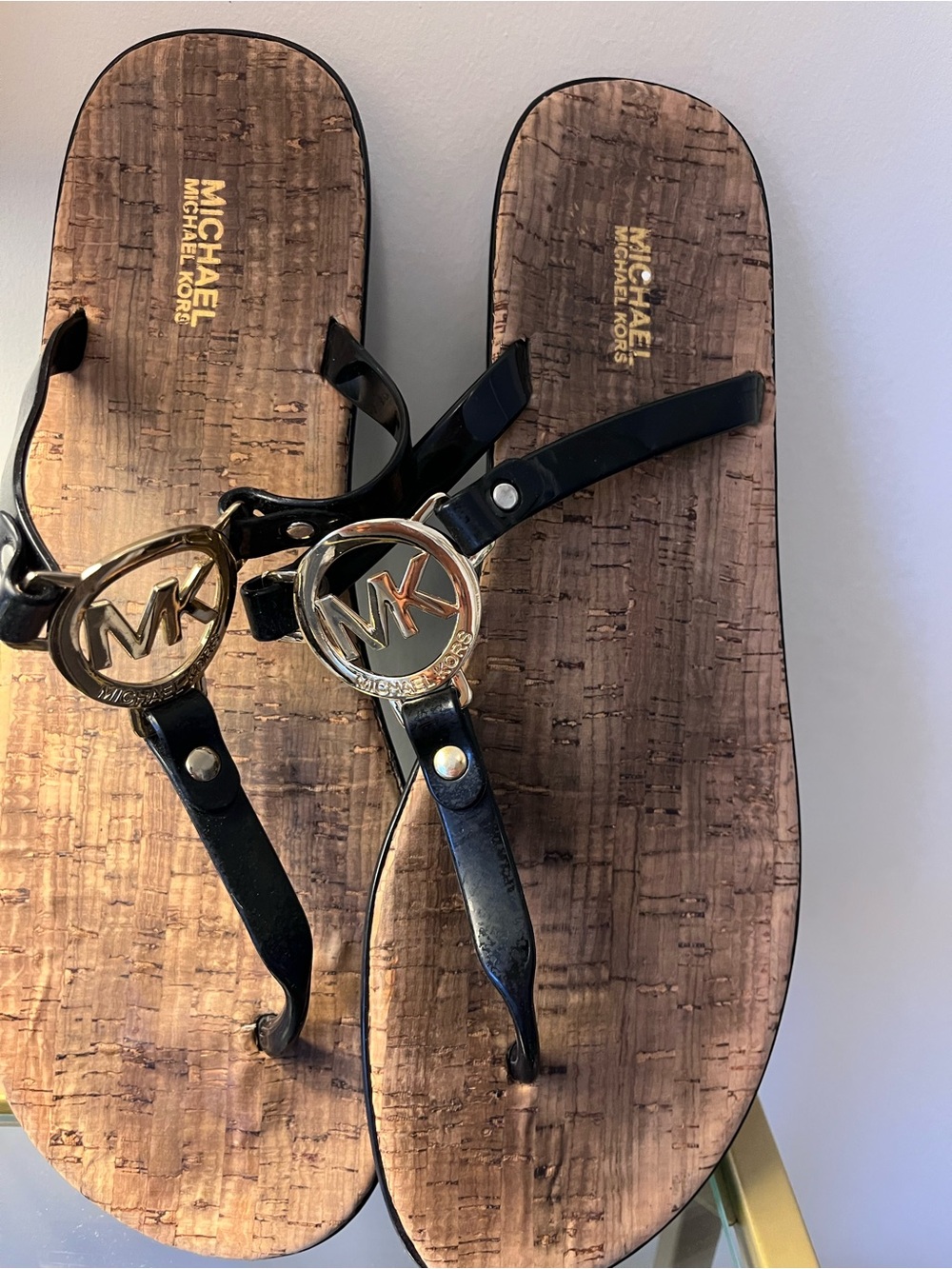 Michael Kors Black Thong Sandals with Gold MK Medallion